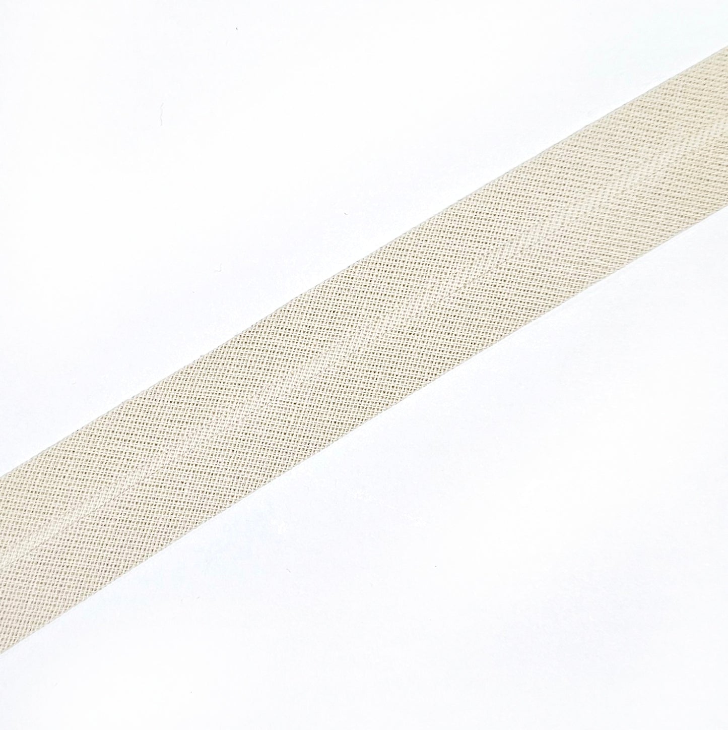 Beige biaisband van 2cm breed.