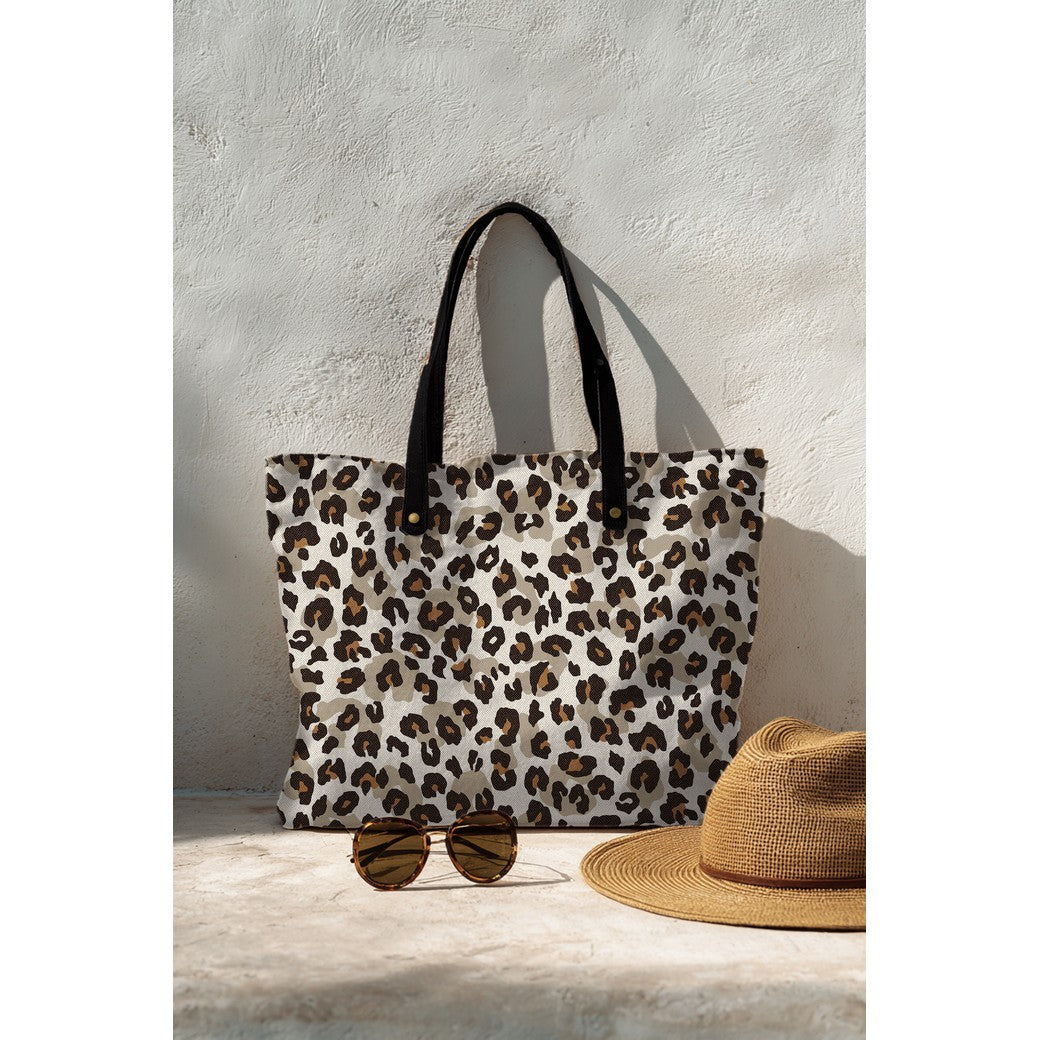 Tas gemaakt van canvas met luipaard print.