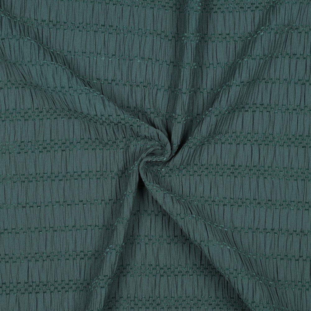 Sage groene chenille jacquard stof voor bijvoorbeeld een jumpsuit of broek met top.