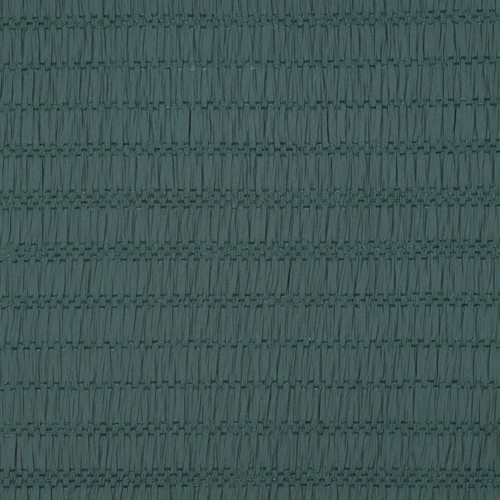 donkergroene rekbare jacquard stof voor bijvoorbeeld jurken op een top.