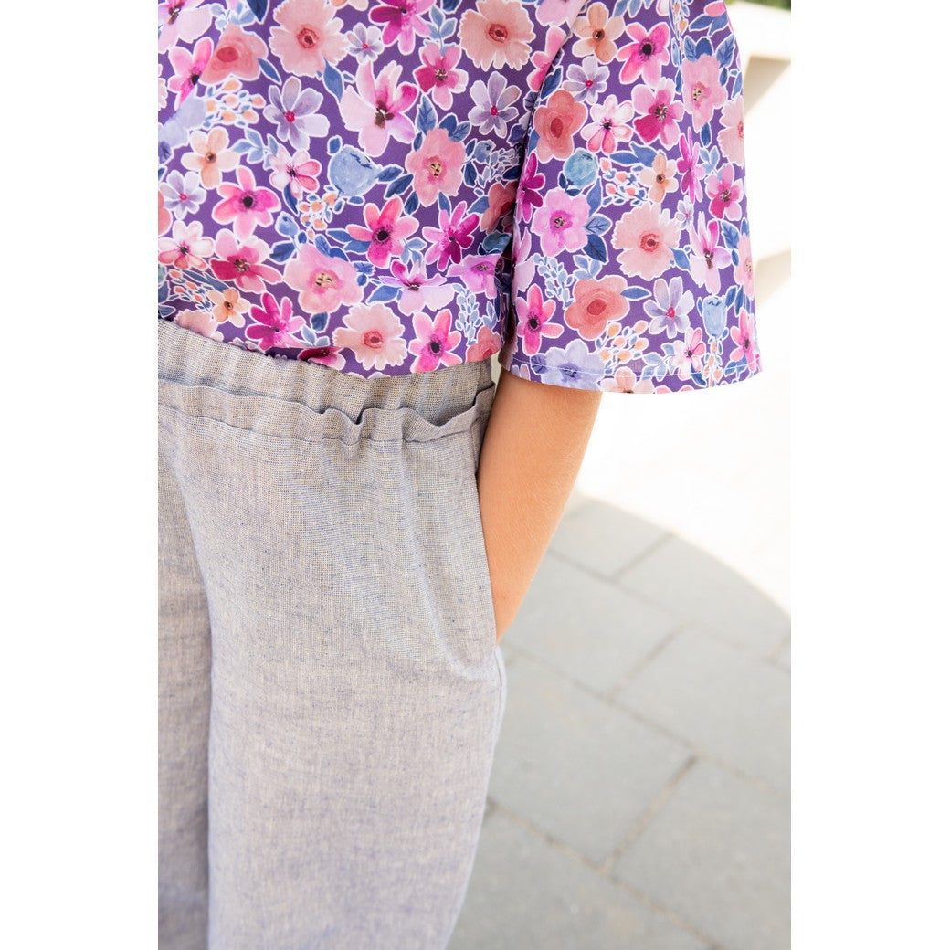 Broek gemaakt van lichtblauwe katoen linnen lurex.