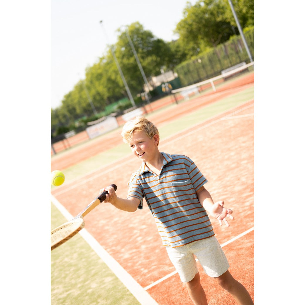 Shirt gemaakt van blauwe rekbare katoenen badstof met bruine strepen.