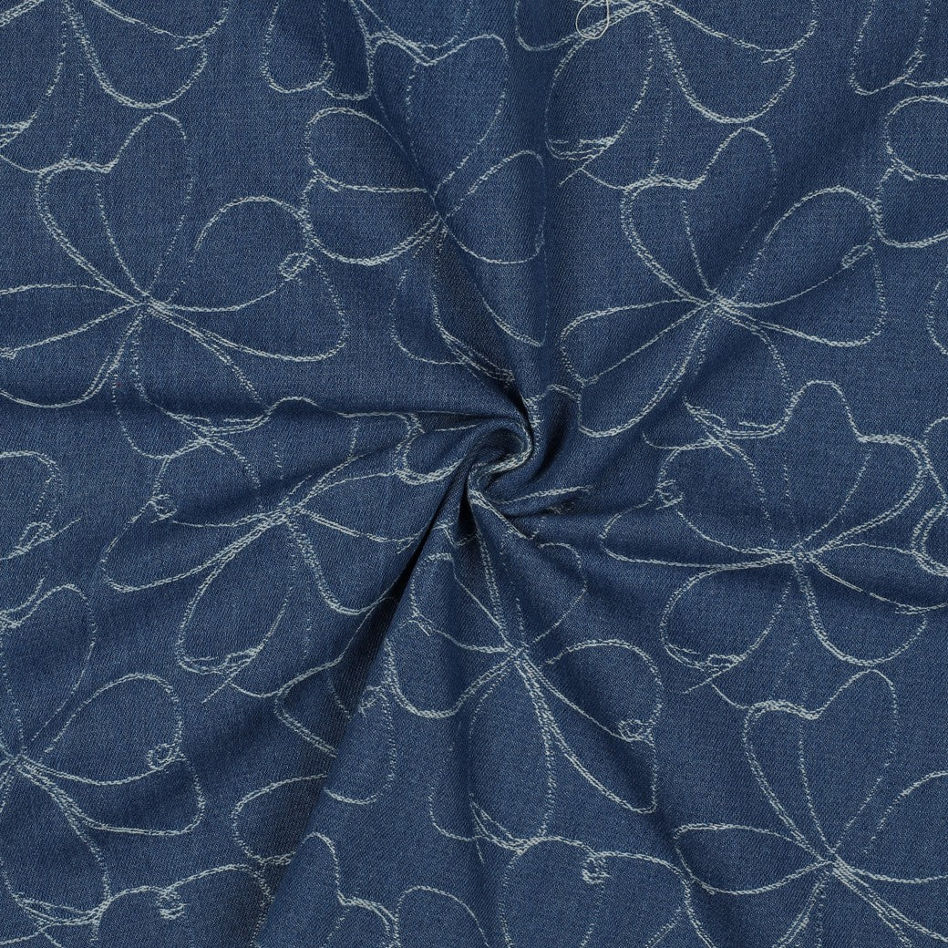 Blauwe denim jacquard met getekende bloemen van poppy.