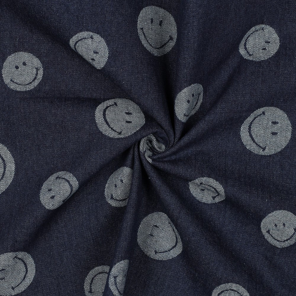 Donkerblauwe spijkerstof jacqard met licht smiley's.