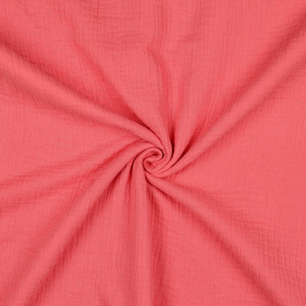 Effen koraal roze hydrofiel stof met luchtige structuur