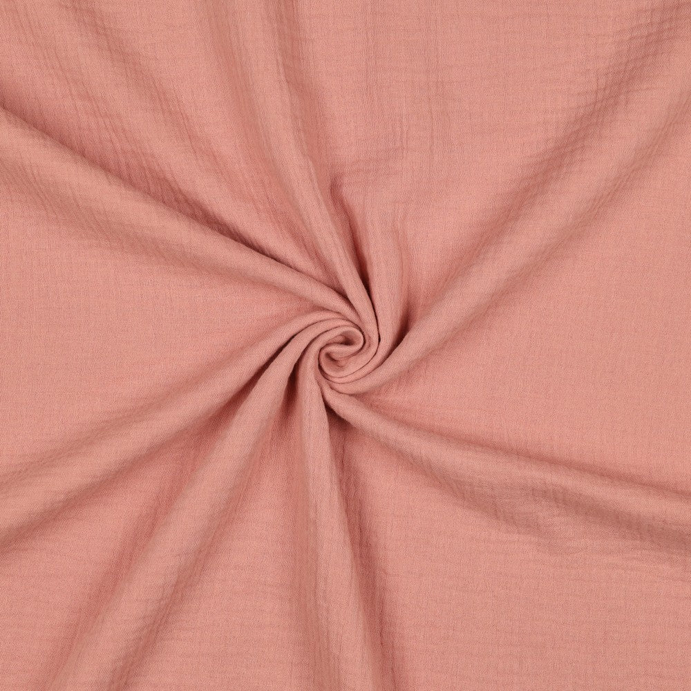 Effen blush roze hydrofiel stof met luchtige structuur