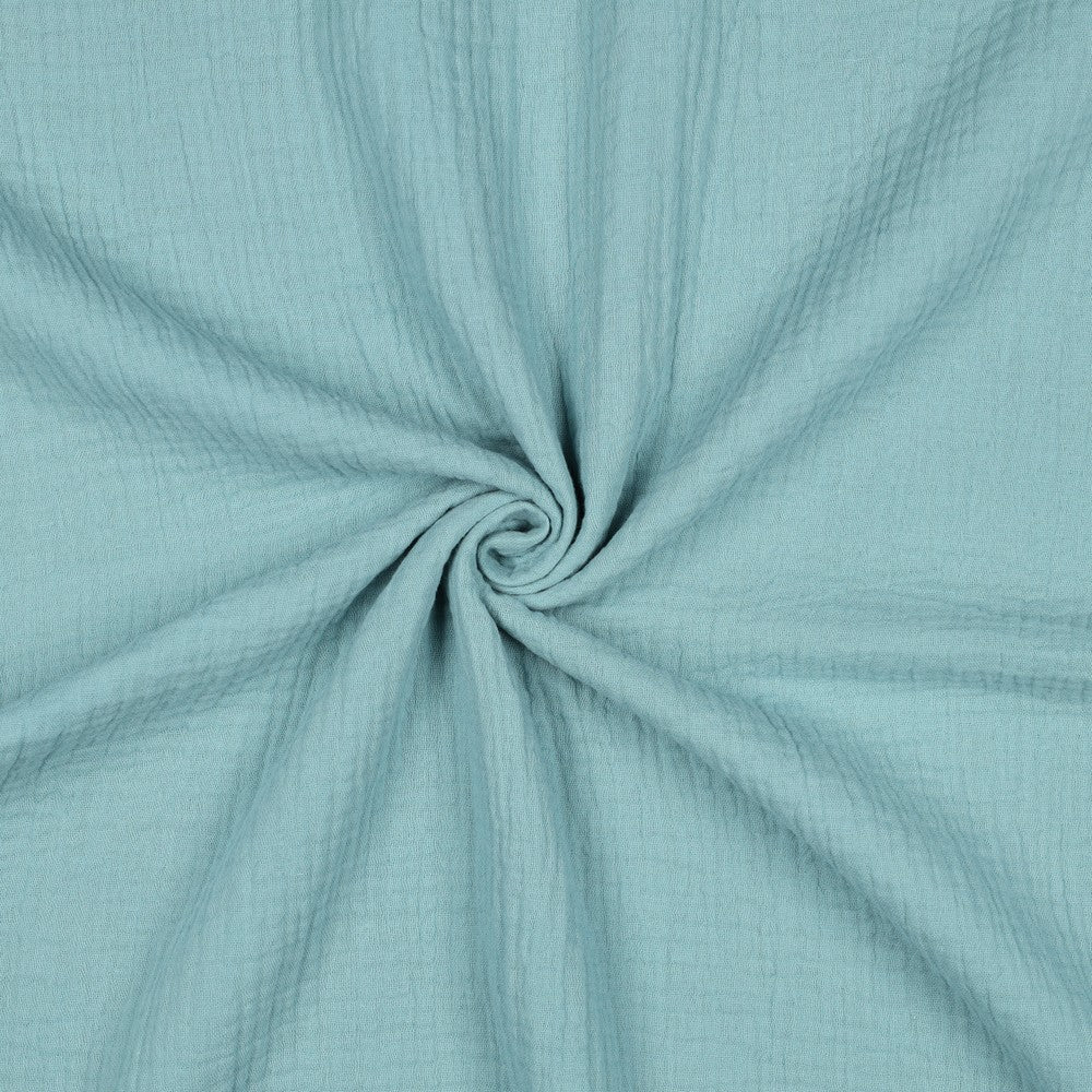 Effen licht petrol blauwe hydrofiel stof met luchtige structuur