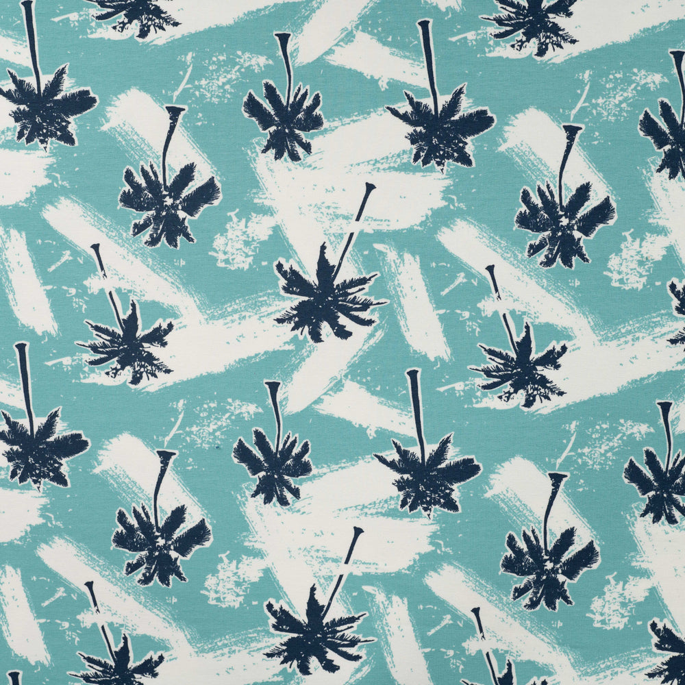 French terry stof zeeblauw met palmboom voor kinderkleding.