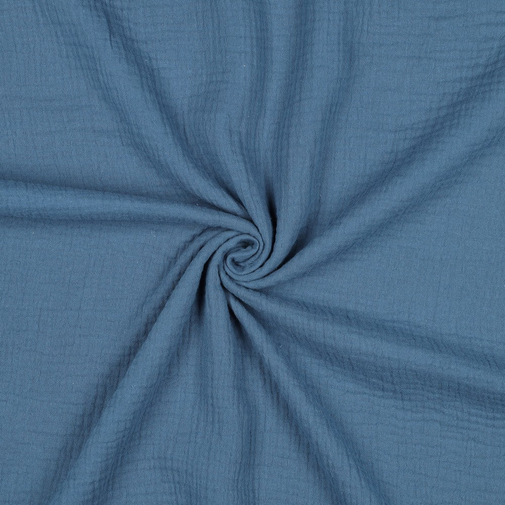 Uni blauwe mousseline voor bijvoorbeeld een jongens blouse of korte broek.