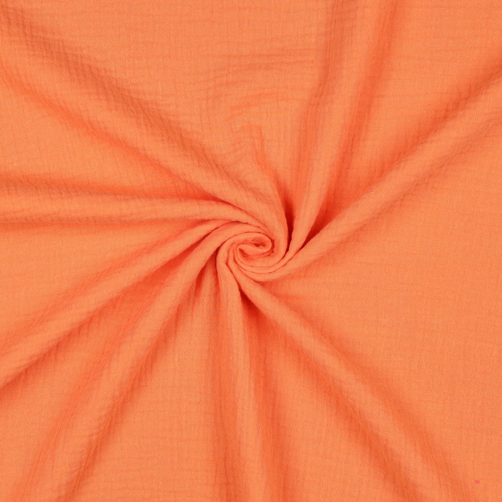 Oranje hydrofiel of double gauze voor zomerse kleding of voor koningsdag.