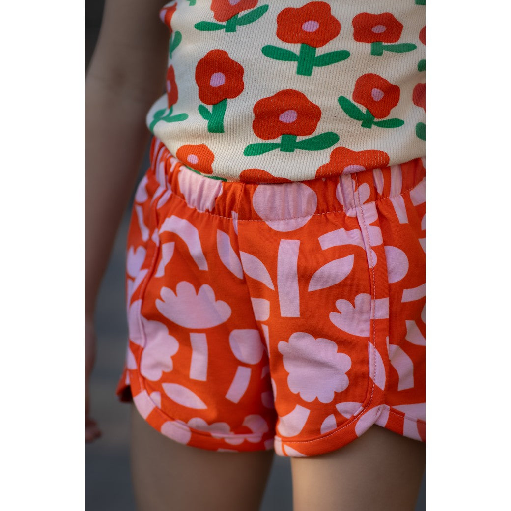 Broek gemaakt van jersey stof organic bloemen rood oranje roze van Jennifer Bouron
