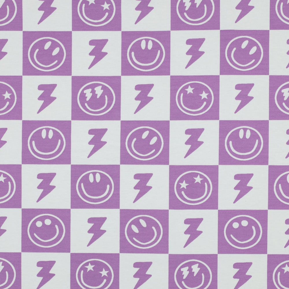 Lavendel paarse blokjes met smiley en bliksem tricot voor bijvoorbeeld een pyjama voor meisjes.