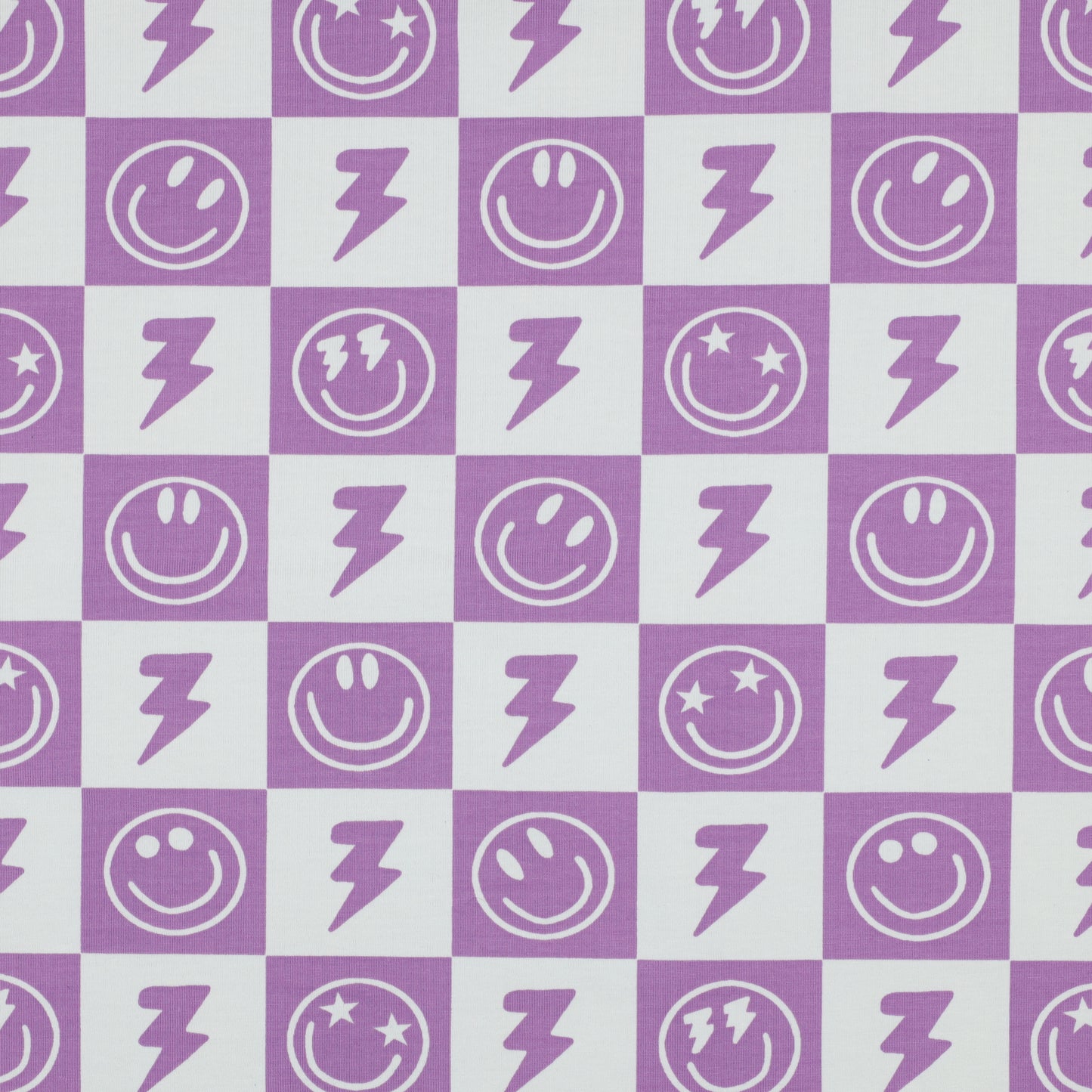 Lavendel paarse blokjes met smiley en bliksem tricot voor bijvoorbeeld een pyjama voor meisjes.