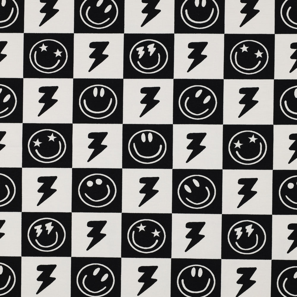 Jersey met zwart witte blokjes met smileys en bliksem voor jongenkleding.