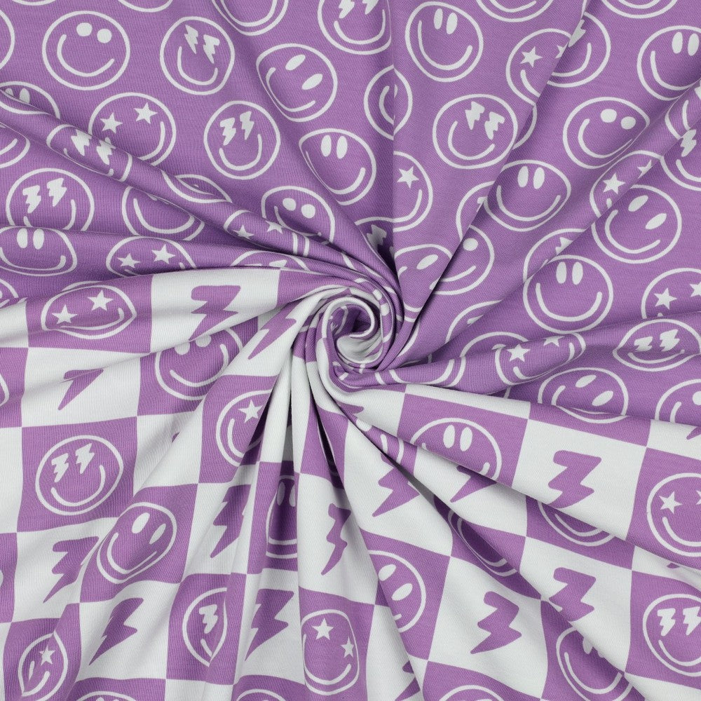 Lavendel paarse smiley en blokjes gecombineerd voor bijvoorbeeld een pyjama of zomerkleding voor meisjes.