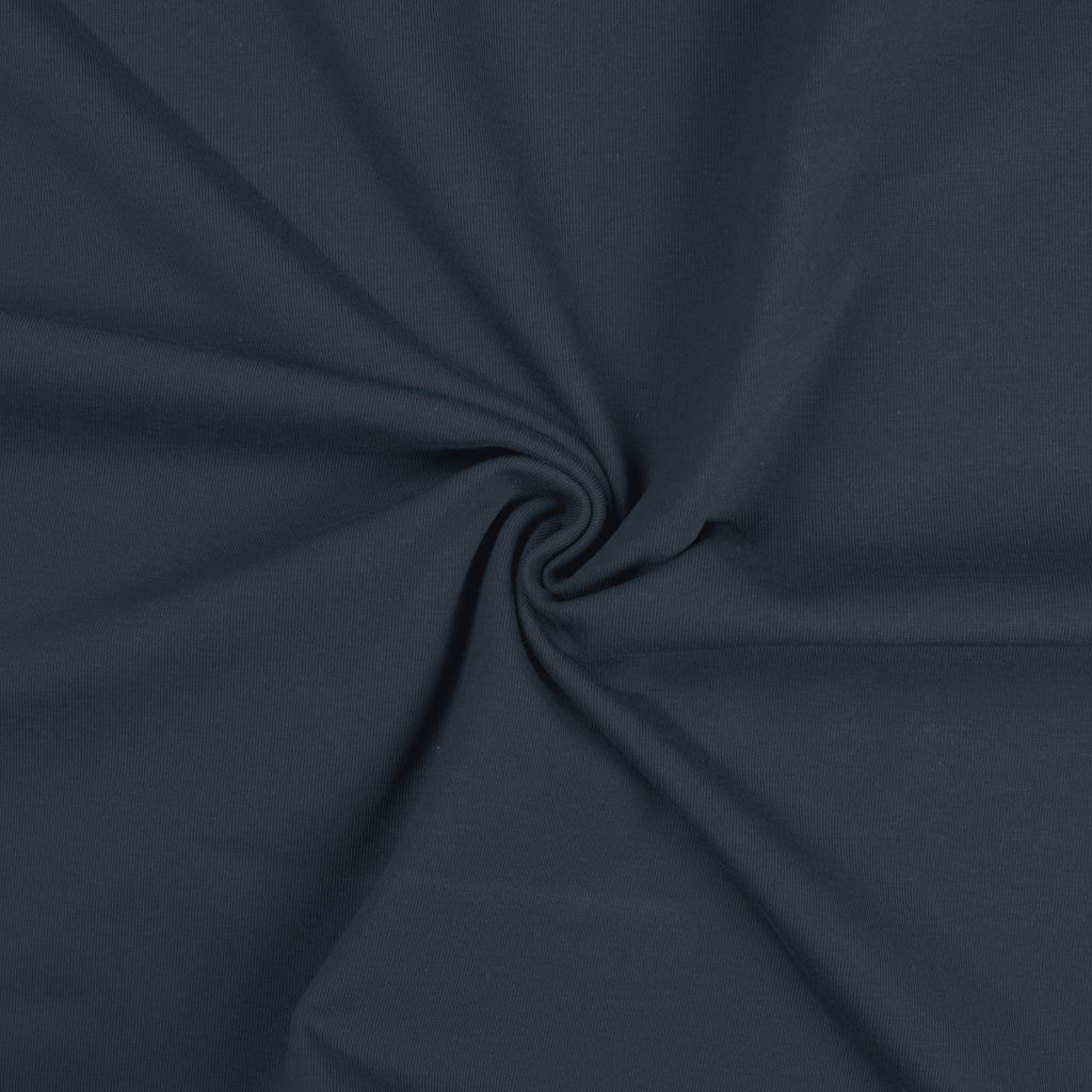 Denim blauwe uni katoenen tricot stof.