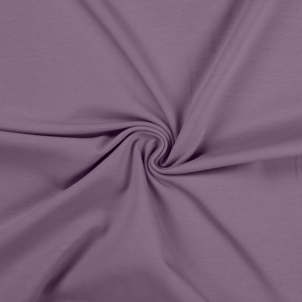 Uni katoenen tricot stof in de kleur dusty lila.