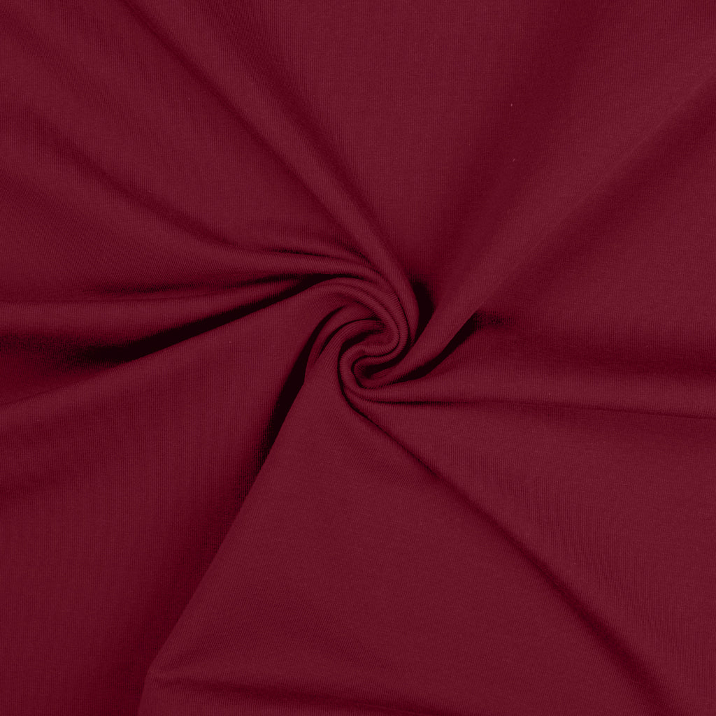 Uni katoenen tricot stof in de kleur wijnrood.