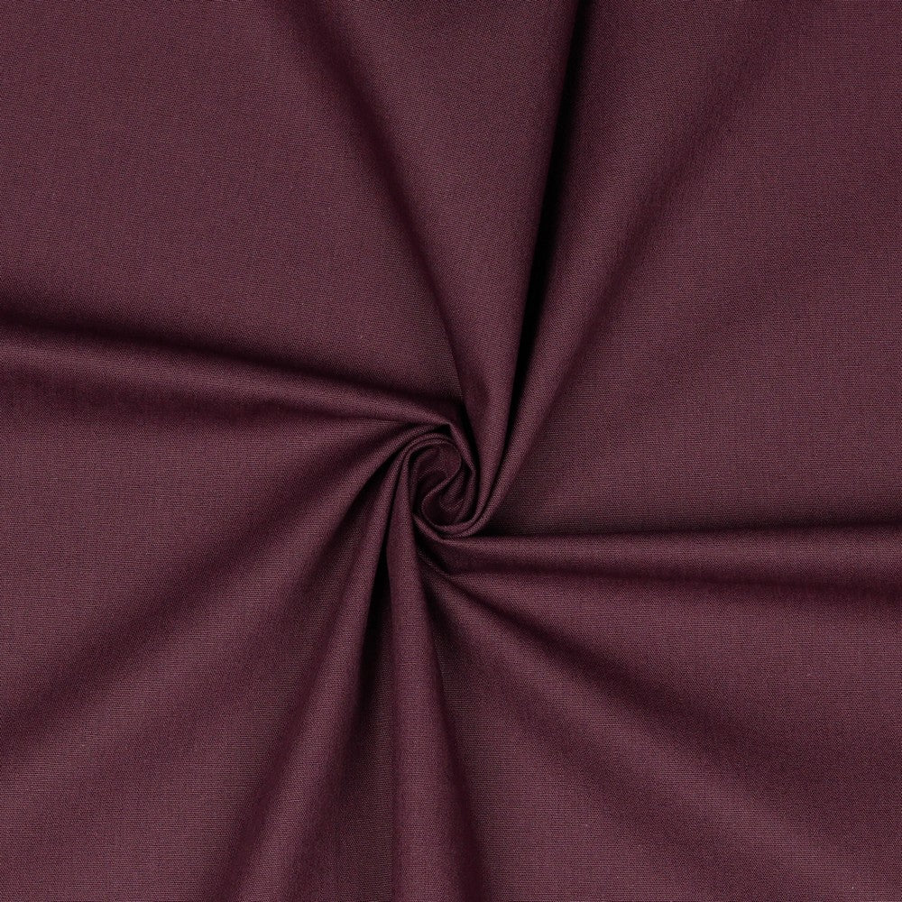 Uni katoenen poplin in de kleur aubergine.
