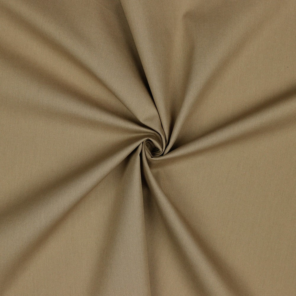 Taupe kleurige uni katoenen poplin.