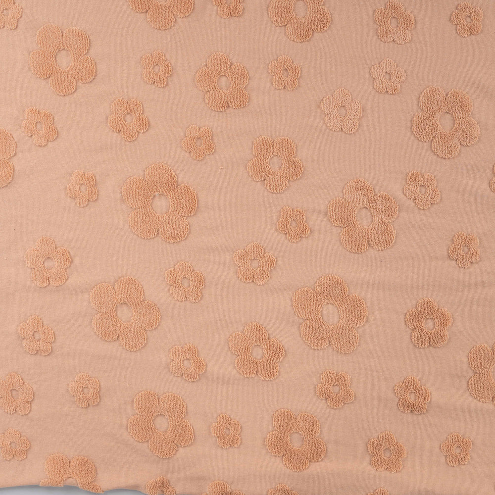 Rekbare katoen stof met badstof bloemen.
