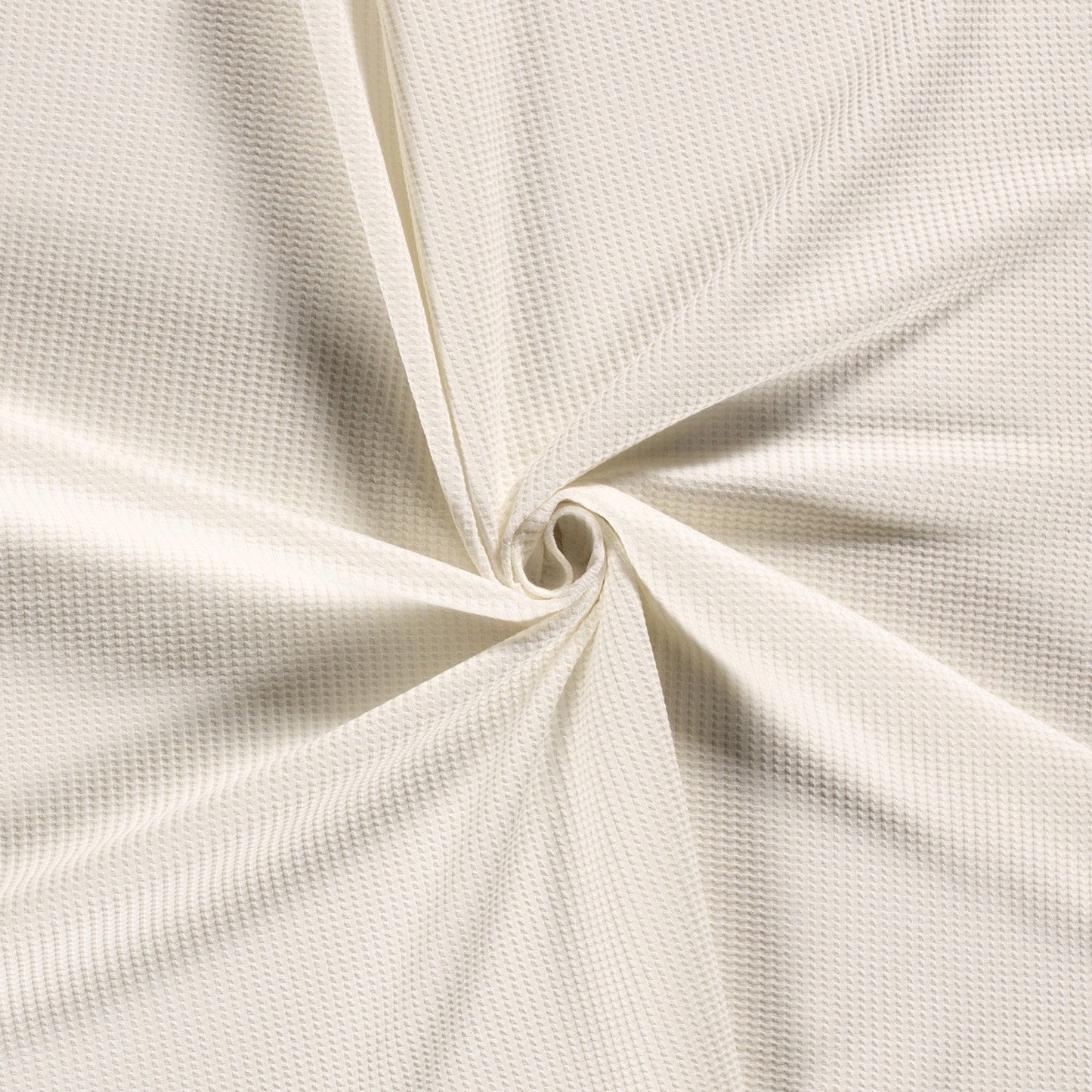 Gebreide wafelstof met stretch in de kleur offwhite.