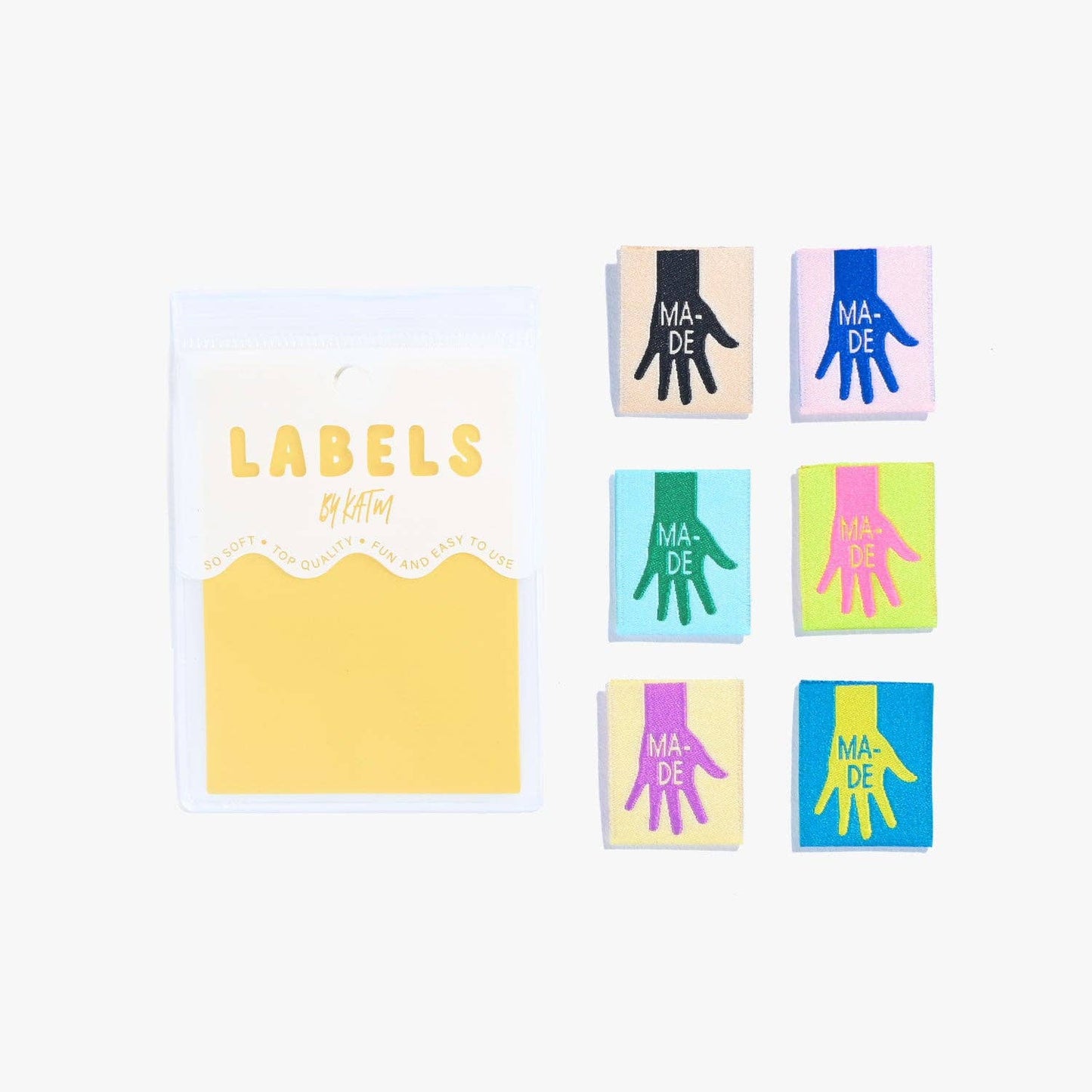 KATM made labels met een handje voor op kleding te naaien.