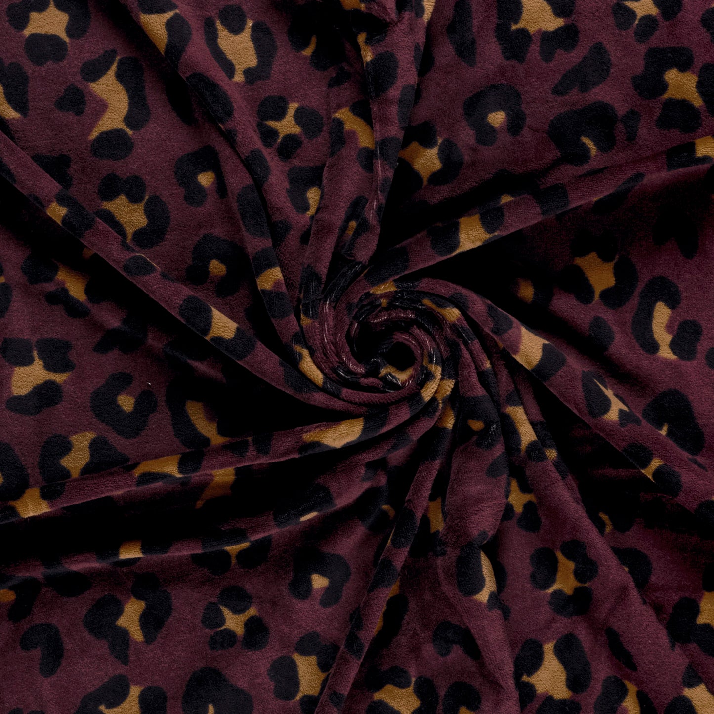 Zachte nicky velours stof in de kleur aubergine met luipaard print.