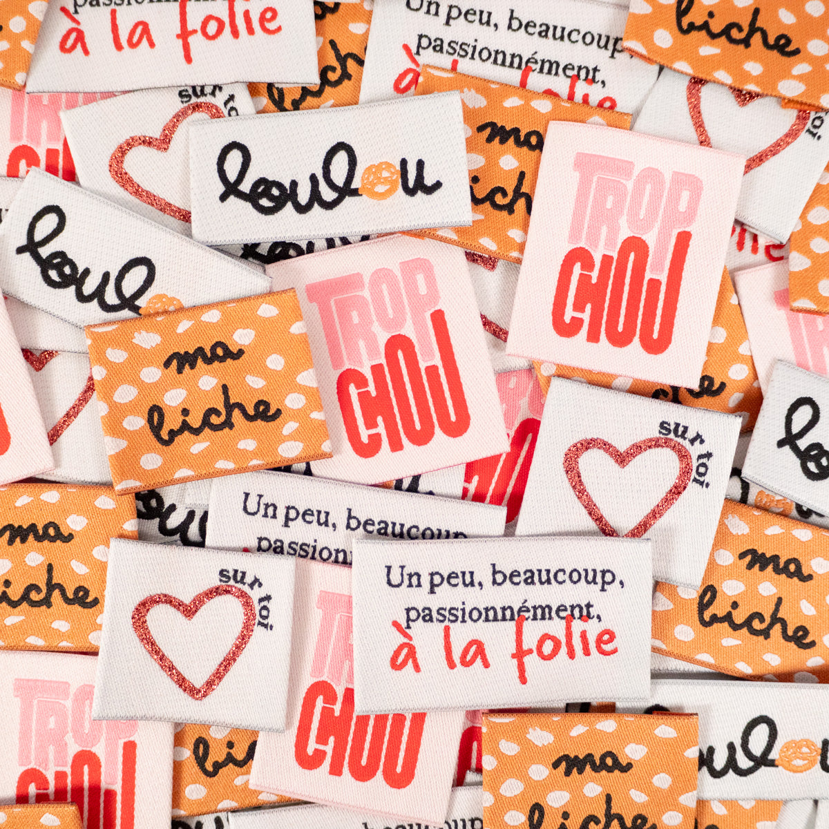 Set geweven labels met tekst en hartjes voor kleding van Ikatee