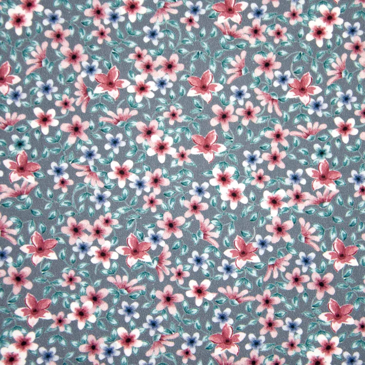 Katoenen poplin in blauw grijze kleur met bloemetjes.