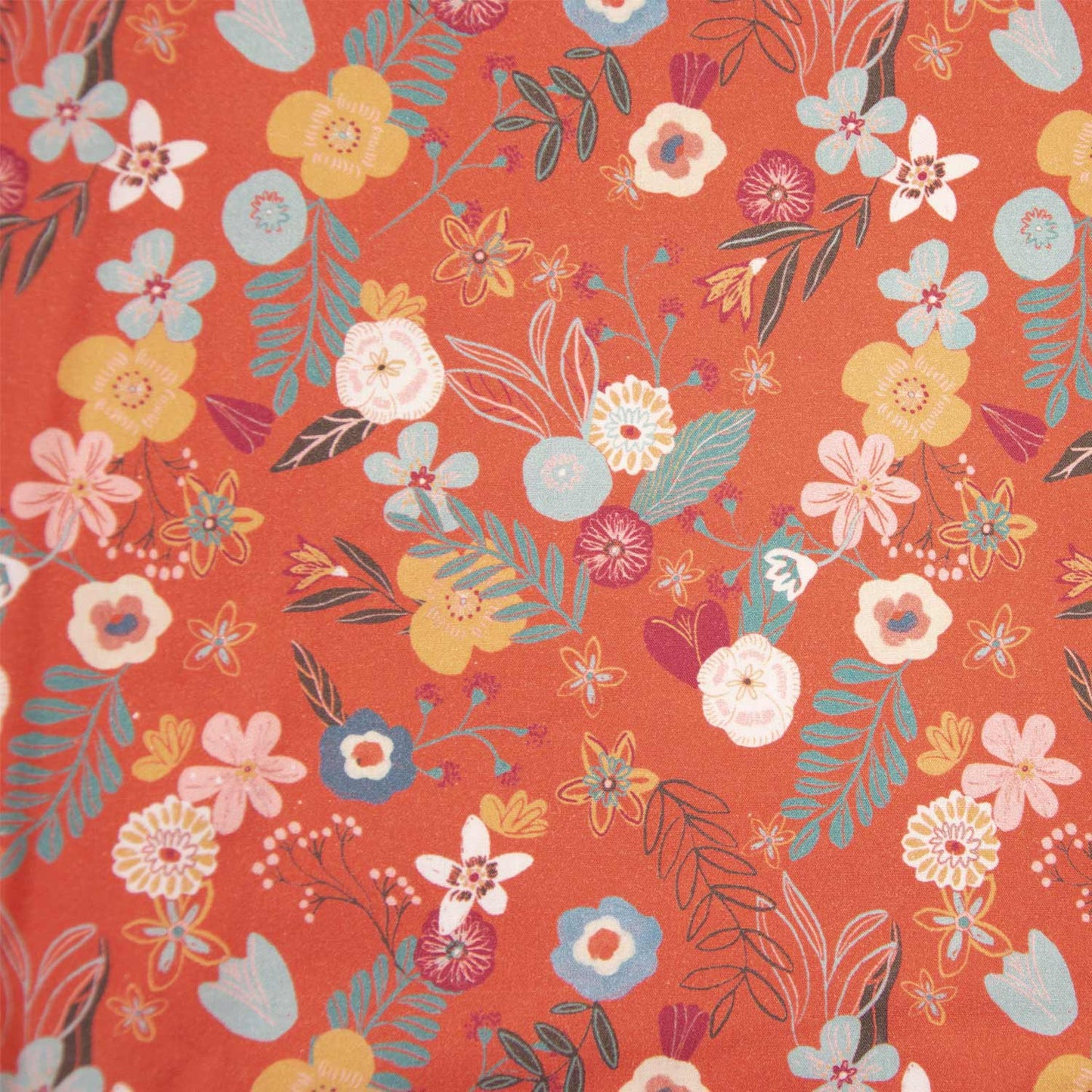 Katoenen poplin in herfst brick kleur met gekleurde bloemen.