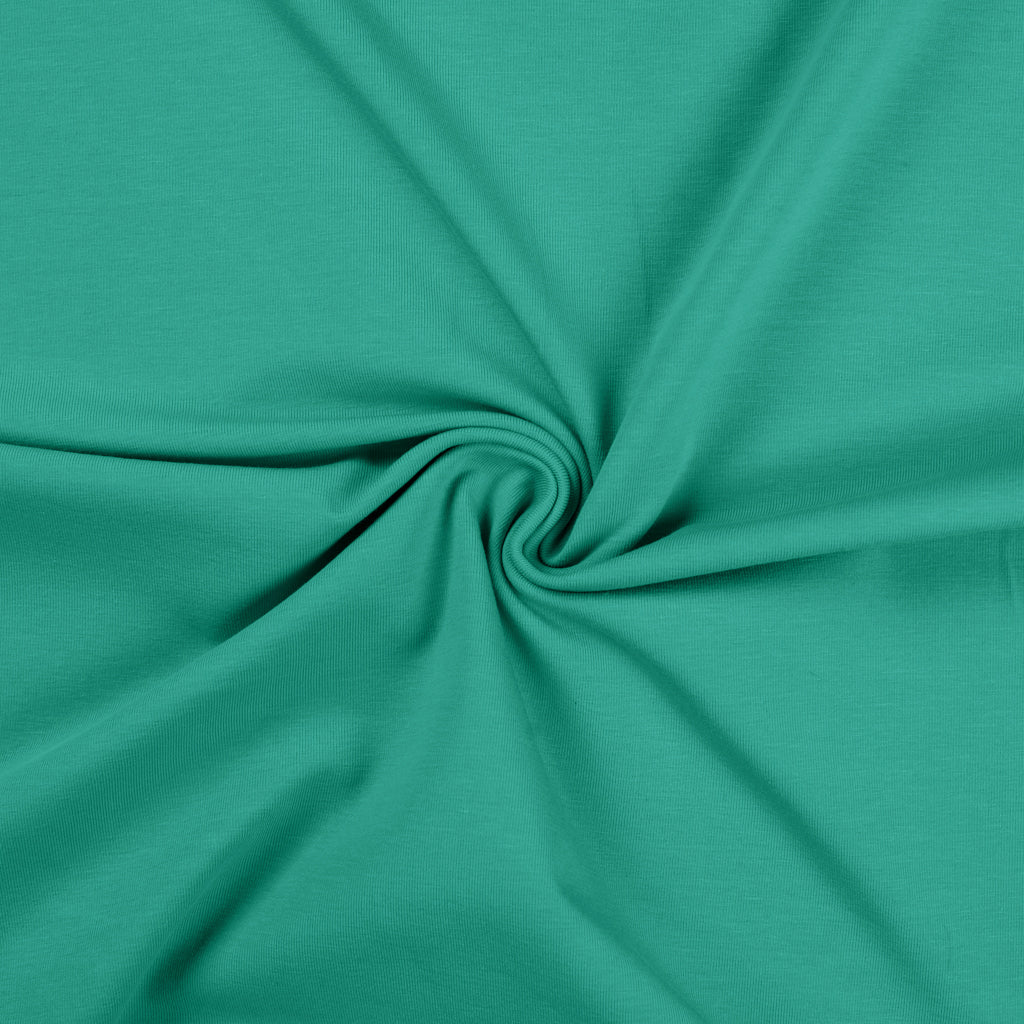 Triffany groene uni katoenen tricot stof.