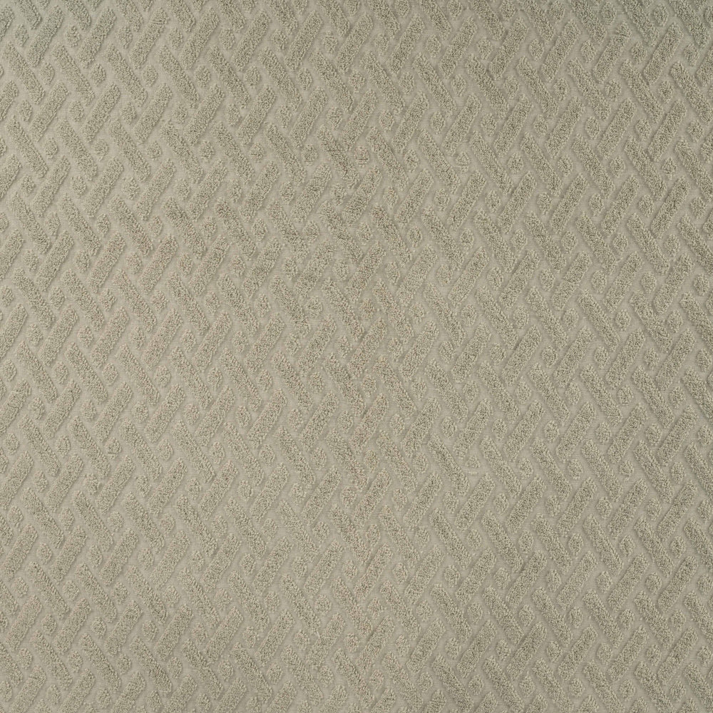 Rekbare badstof jacquard kaki met grafische print.