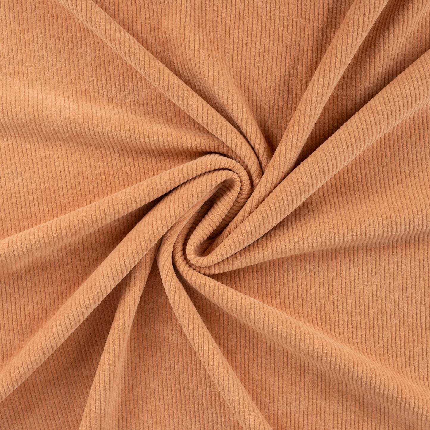 Velours ribtricot met brede rib zalmroze.