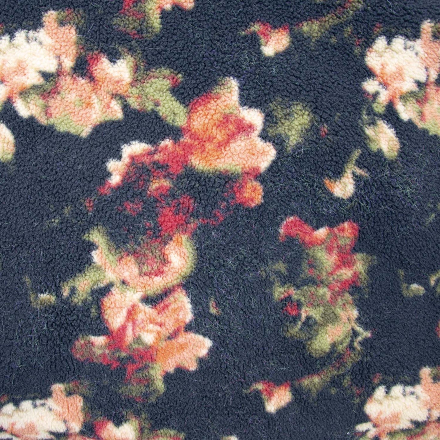 Zwart gebloemde sherpa fleece stof.