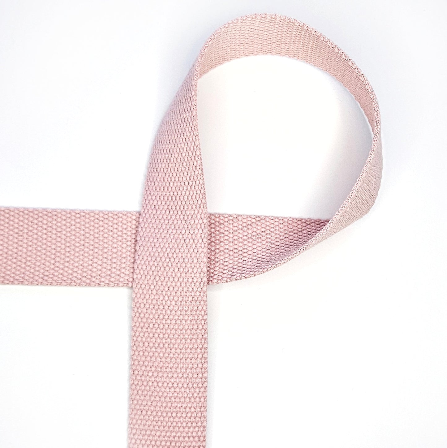 Licht oudroze tassenband.