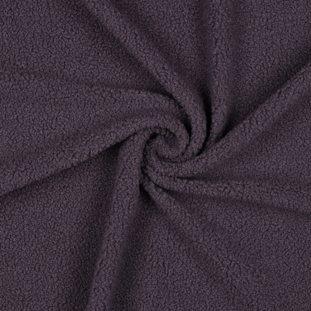 Zachte teddy faux fur in de kleur paars.