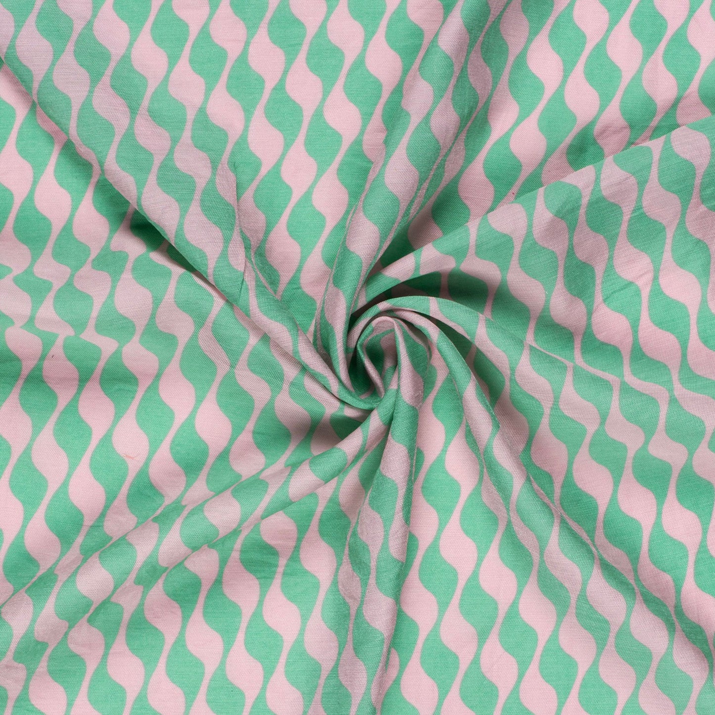 Viscose twill met abstract motief in kleuren groen met roze voor bijvoorbeeld een jumpsuit of broek voor de zomer.