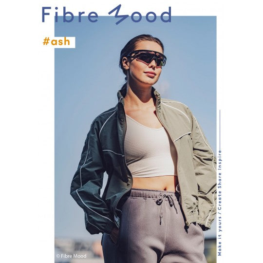 Jas ash van fibre mood gemaakt van waterdichte groene nylon stof voor sport en outdoor kleding.