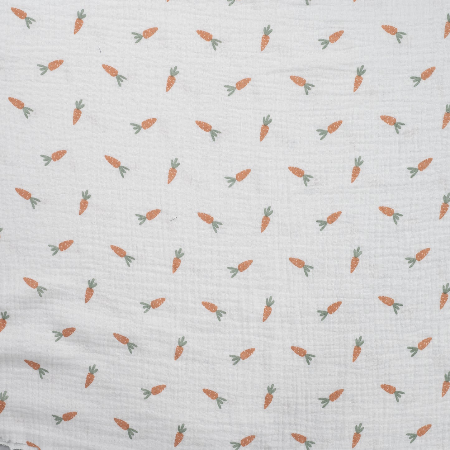 Witte mousseline met wortels voor bijvoorbeeld babykleding.