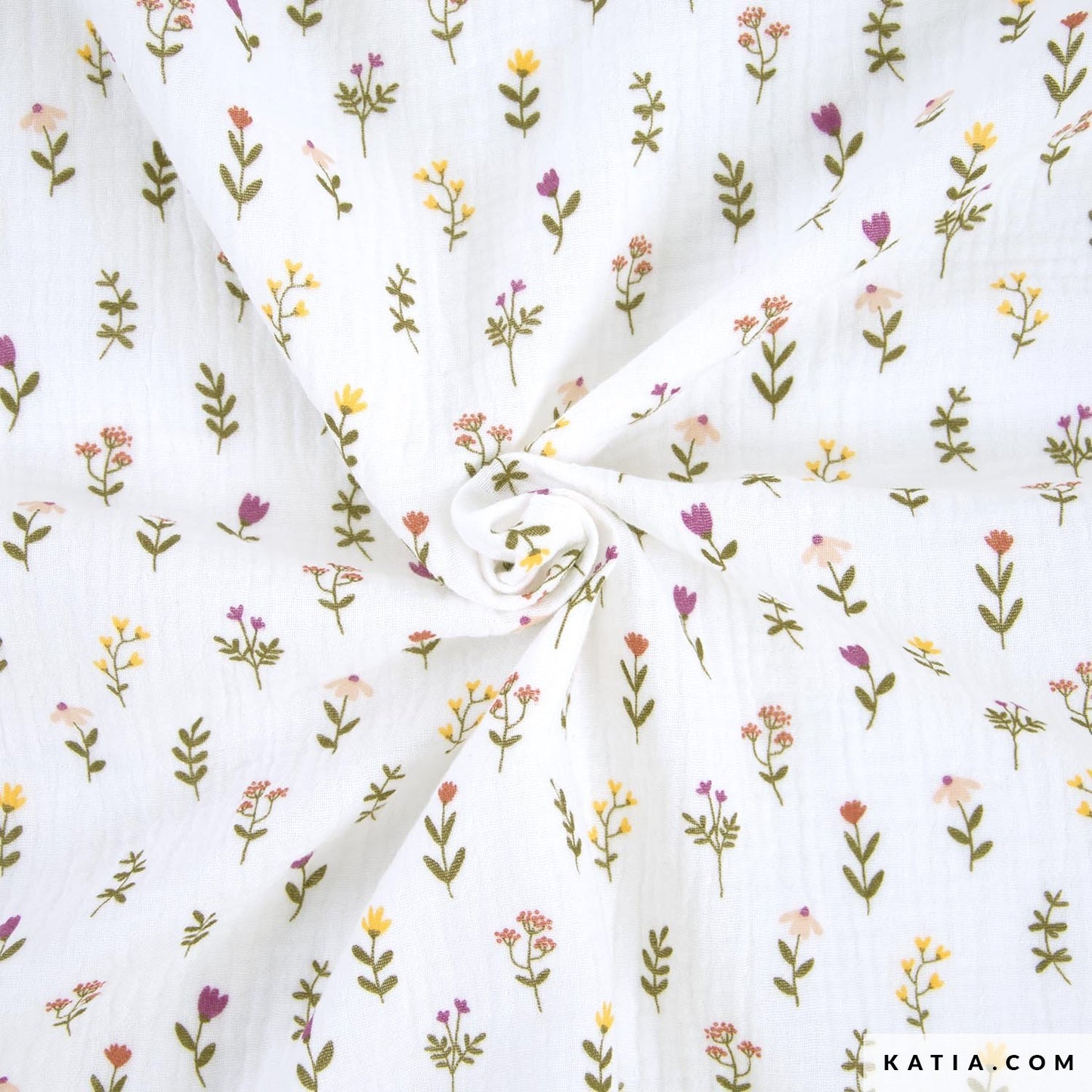 Witte mousseline met kleine zomerse bloemetjes.