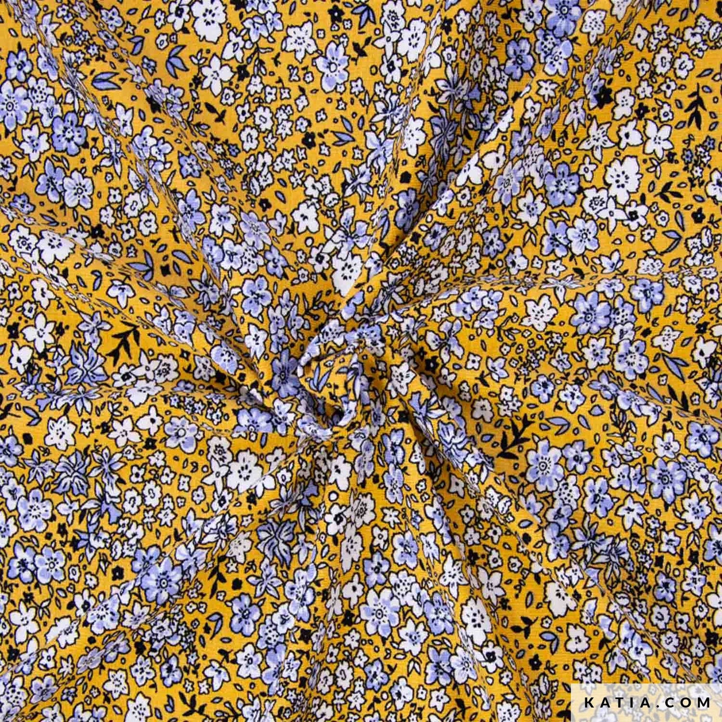 Gele viscose tricot met kleine licht blauwe en witte bloemetjes voor het maken van bijvoorbeeld een jurk of shirt.